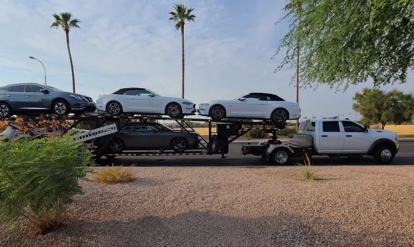 Car hauler with three cars Car hauler with three cars